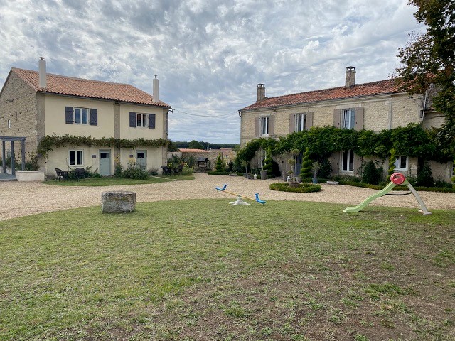 outside of holiday home Sans Soucis gites showing play area for children