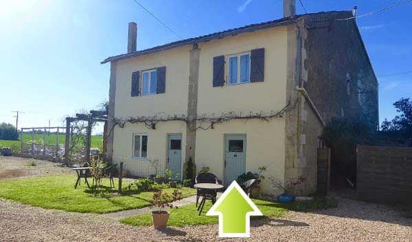 front of french attached gites with arrow pointing to the right hand building, gite Wheatfields