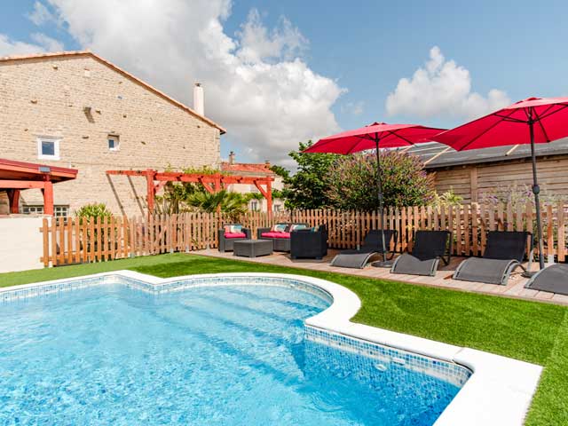 pool side chairs and parasols