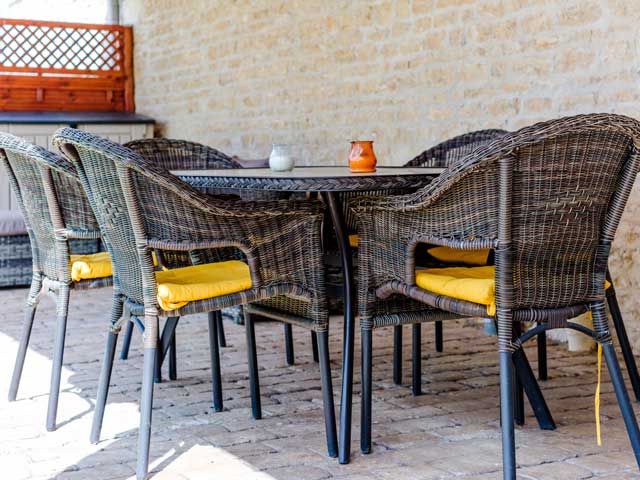 outdoor patio furniture with yellow cushions